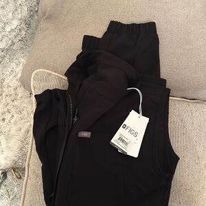 Figs never worn black jumpsuit size small. With tags.